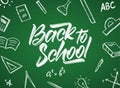 Vector Handwritten typographic lettering of Back to School with doodles supplies on blackboard background Royalty Free Stock Photo