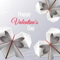 Vector Happy Valentine\'s Day greeting card with three origami hearts with colored paper cut on a decorated background.