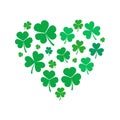 Vector heart made of small shamrock or clover icons
