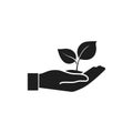 Vector illstration of plant in hand icon. Flat design. Isolated.