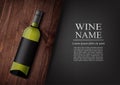 Advertising banner.A realistic bottle of white wine with black label in photorealistic style on wooden dark board,black