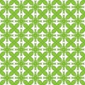 Vector illustration background image geometric seamless pattern drawing green flowers with a black outline and square middle on a Royalty Free Stock Photo