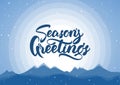 Vector illustration. Blue winter mountains background with hand lettering of Season`s Greetings Royalty Free Stock Photo