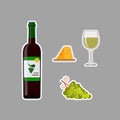Bottle of white wine, wine glass, grapes and cheese, stickers isolated on gray background Royalty Free Stock Photo