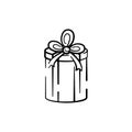 Vector illustration of a box with a gift hand-drawn. Vector icon black line isolated on white background for design