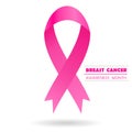 Pink ribbon with shadow on white background.