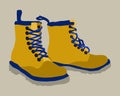 Vector illustration of bright yellow travel boots with blue details.