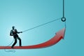 Vector illustration of business concept, a businessman lifting arrow symbol using a pulley