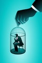 Vector illustration of business concept, small businessman sitting in a cage of birds