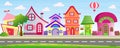 Vector illustration of cartoon houses in bright colors on sky background with clouds and balloon. Colorful lovely and