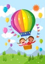 Cartoon kids riding a hot air balloon over the field Royalty Free Stock Photo