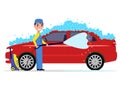 Vector illustration of a cartoon man washes a car Royalty Free Stock Photo