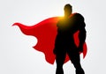 Vector Illustration Silhouette of a Superhero with red cape posing Royalty Free Stock Photo
