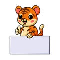 Cute baby tiger cartoon with blank sign and giving thumb up Royalty Free Stock Photo