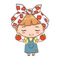 Girl in headscarf holding red tomato