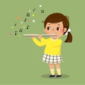 Cute little girl playing the flute on green background