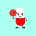 Vector illustration of Cute Pill medical mascot or character holding sign says stop. Cute Pill medical character concept Royalty Free Stock Photo