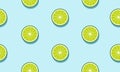 Seamless blue background with limes slices with shadow.