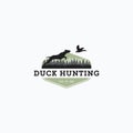 Vector illustration of dog hunt the flying duck good for duck hunting club logo, badge, and sticker design Royalty Free Stock Photo