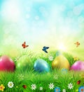 Vector illustration. Easter greeting card with colorful eggs lying on the green grass against the blue sky. Design element, greet