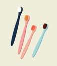 Vector illustration of four colored toothbrushes in blue, pink, and sky-blue color.