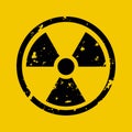 Vector illustration of grunge black radioactive hazard warning sign painted over yellow background Royalty Free Stock Photo