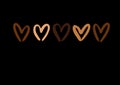 Vector illustration of grunge brush hearts of different chocolate colors isolated on black.