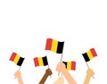 hands holding Belgium flags