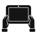 Vector illustration of hands holding a tablet in a simplified black icon style Royalty Free Stock Photo