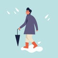 Vector illustration of happy man in autumn season clothes. Young man walking and holding umbrella. Rainy weather.