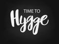 Vector illustration of hygge text for logo on chalkboard