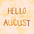 Vector illustration inscription hello August on an orange background bokeh