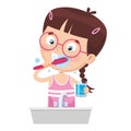 Vector Illustration Of Kid Brushing Teeth