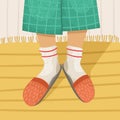 Vector illustration of a man in a terry dressing gown and slippers with socks