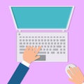 Vector illustration of a man working with his hands on a laptop computer with a mouse and keyboard on a pink background, top view Royalty Free Stock Photo