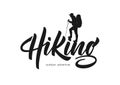 Vector illustration: Modern brush lettering of Hiking with silhouette of climber