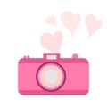 The old-fashioned color camera. Flat style. Vector illustration. hearts in the background Royalty Free Stock Photo