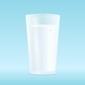 One isolated glass of milk on a blue background