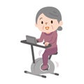 Senior woman exercising on stationary bikes in fitness class Royalty Free Stock Photo