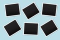 Vector illustration of photo frames. Old photographs on a blue wall. Black Photographs in white frames. Stock image Royalty Free Stock Photo