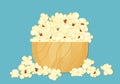 Vector illustration of popcorn packed in a wooden bowl, cartoon style, isolated on a blue background for film, cinema, food,