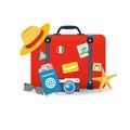 Vector illustration of red vintage suitcase with with different travel elements Royalty Free Stock Photo