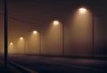 Vector illustration of road lit by lanterns in the fog the night. Street lighting in warm colors