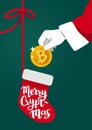 Vector illustration of Santa Claus hand holding a golden bitcoin