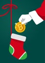 Vector illustration of Santa Claus hand holding a golden bitcoin