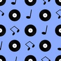 Seamless pattern vinyl and music notes on a blue background. Design element for poster, banner, clothes. Royalty Free Stock Photo