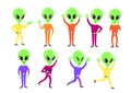 Vector illustration set of happy green aliens characters in different poses and bright clothes on white background