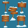 Vector illustration. Set of snow covered old wooden signposts with differently arranged planks isolated on a blue background. Royalty Free Stock Photo