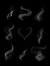 Vector illustration set of transparent different shapes smoke and steam isolated on black background. Royalty Free Stock Photo