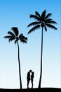 Lovers on sand under palm trees Royalty Free Stock Photo